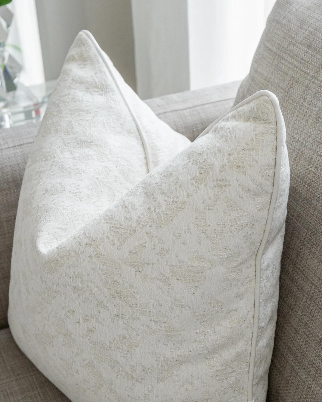 Arcie Bianca cushion in white, shown in a lifestyle right view as image 7