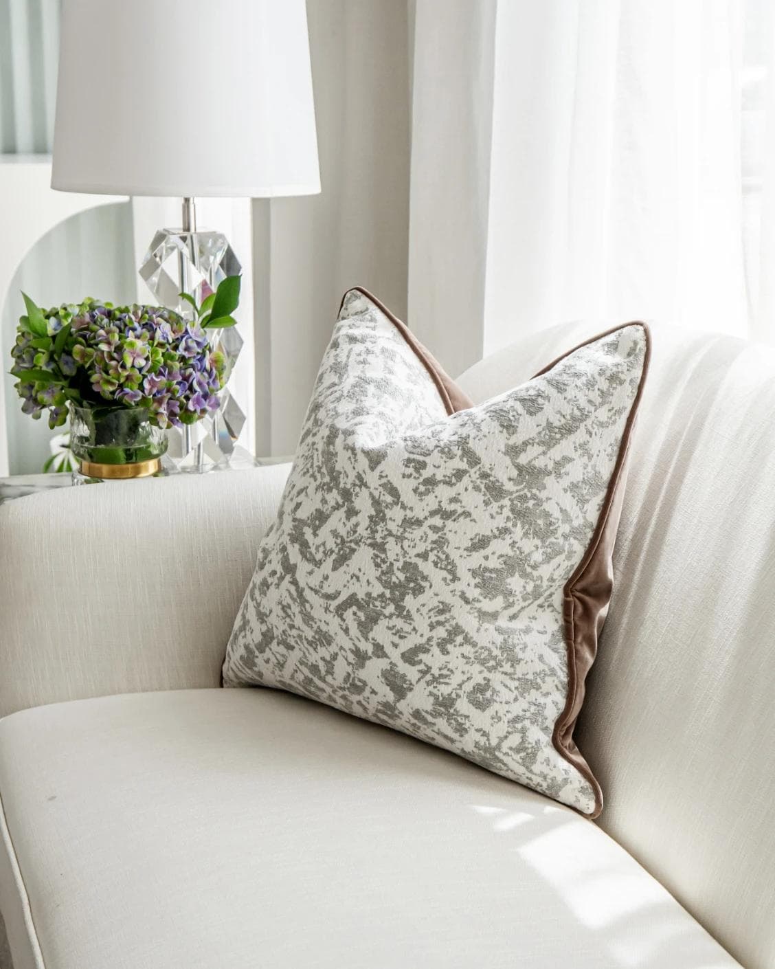 Arcie Laurent cushion in white and silver, shown in a lifestyle right view as image 6