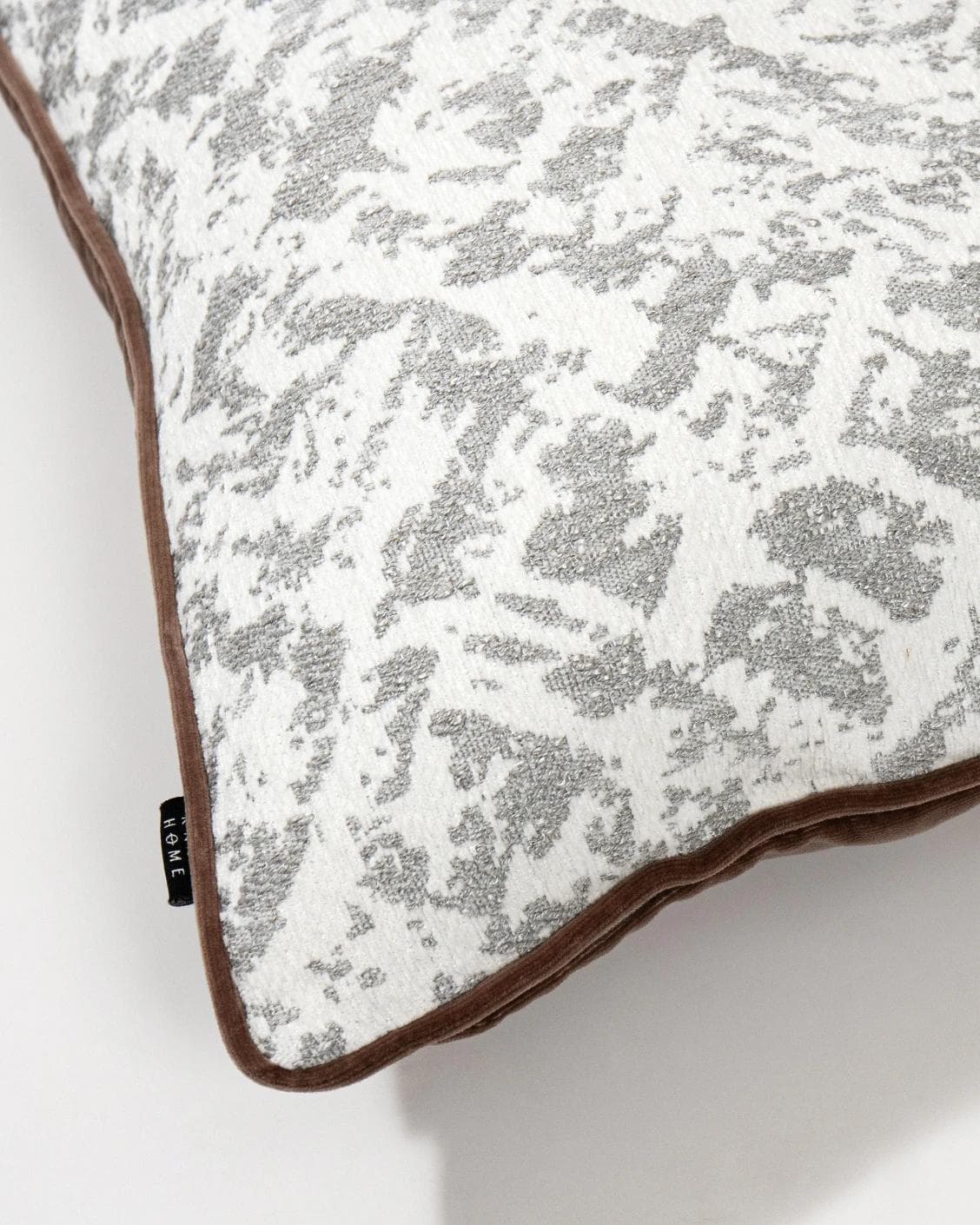 Arcie Laurent cushion in white and silver, shown in a product top view as image 10