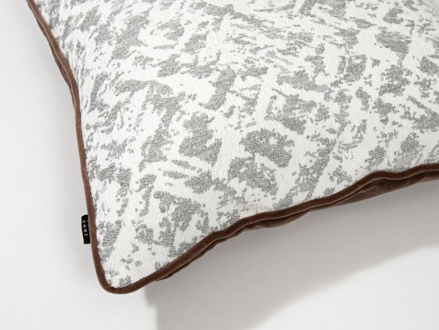 Arcie Laurent cushion in white and silver, shown in a product top view as image 10