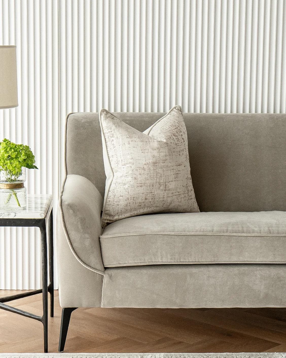 Arlo Bianca cushion in white, shown in a lifestyle front view as image 4