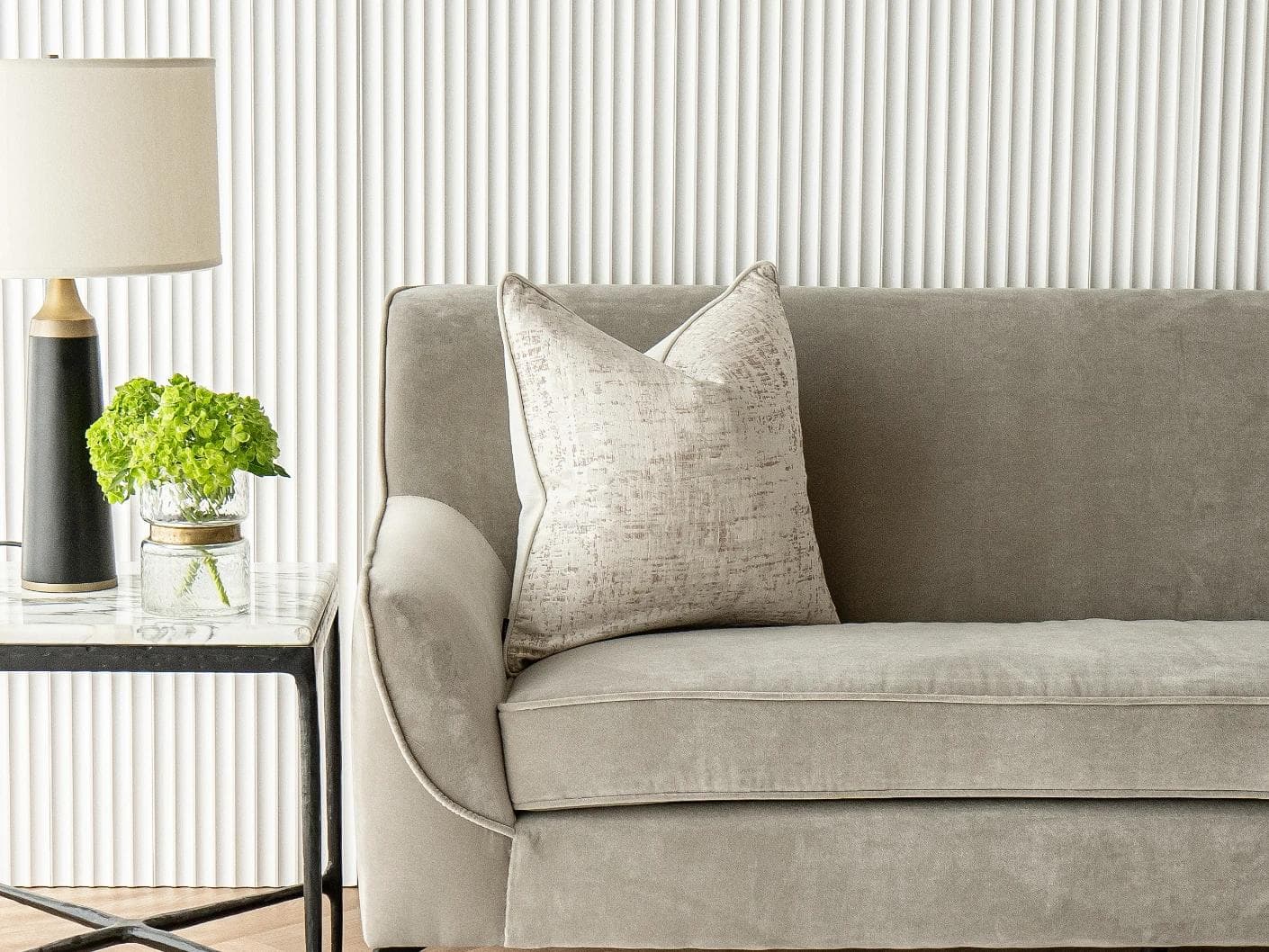 Arlo Bianca cushion in white, shown in a lifestyle front view as image 4