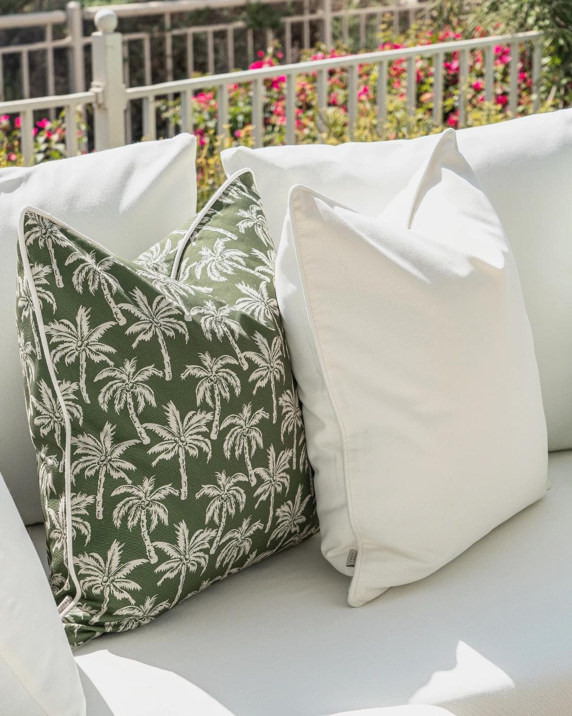 Arsh Bundle cushion in green and ivory, shown in a lifestyle left view as image 6