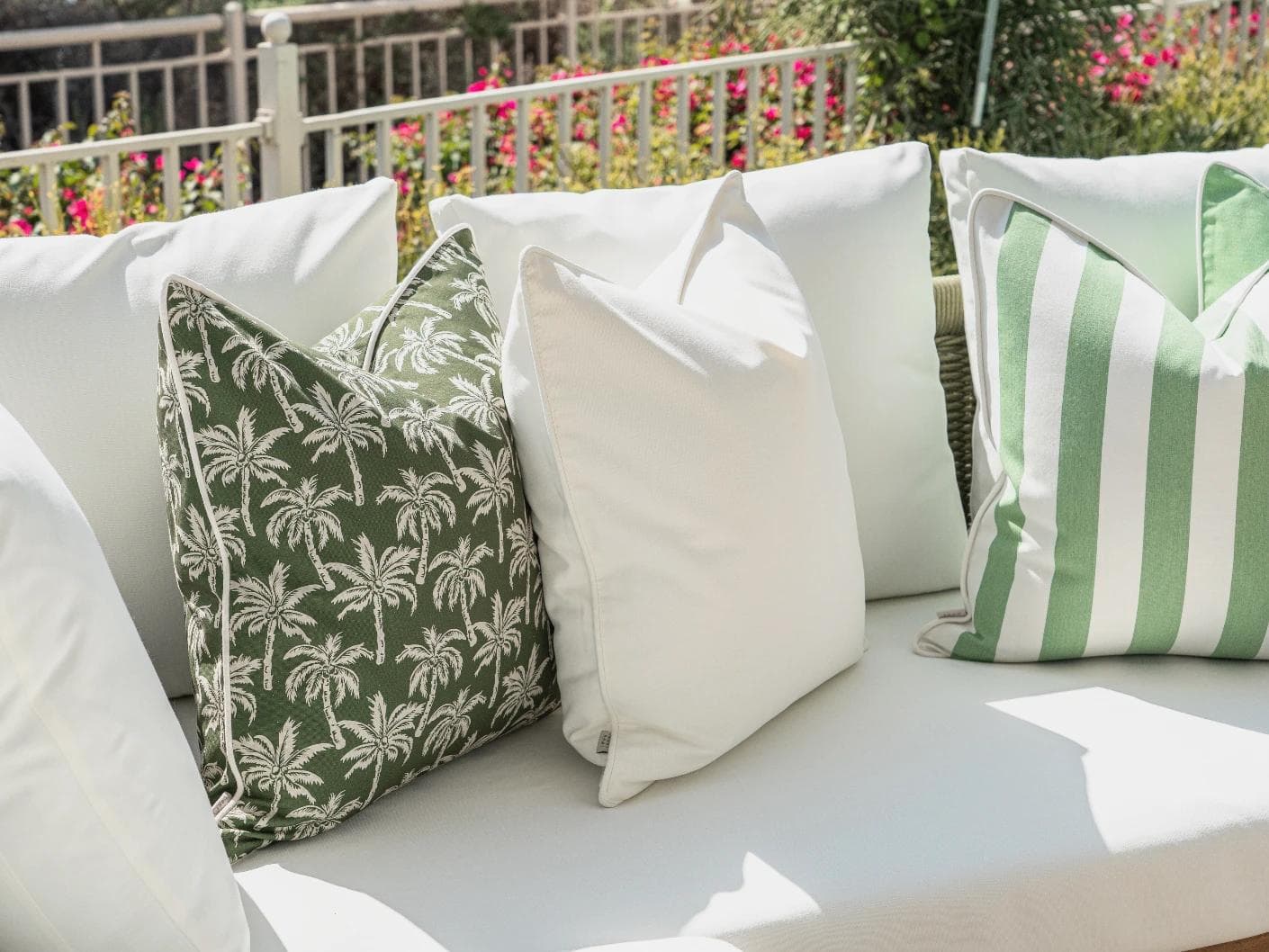 Arsh Bundle cushion in green and ivory, shown in a lifestyle left view as image 6