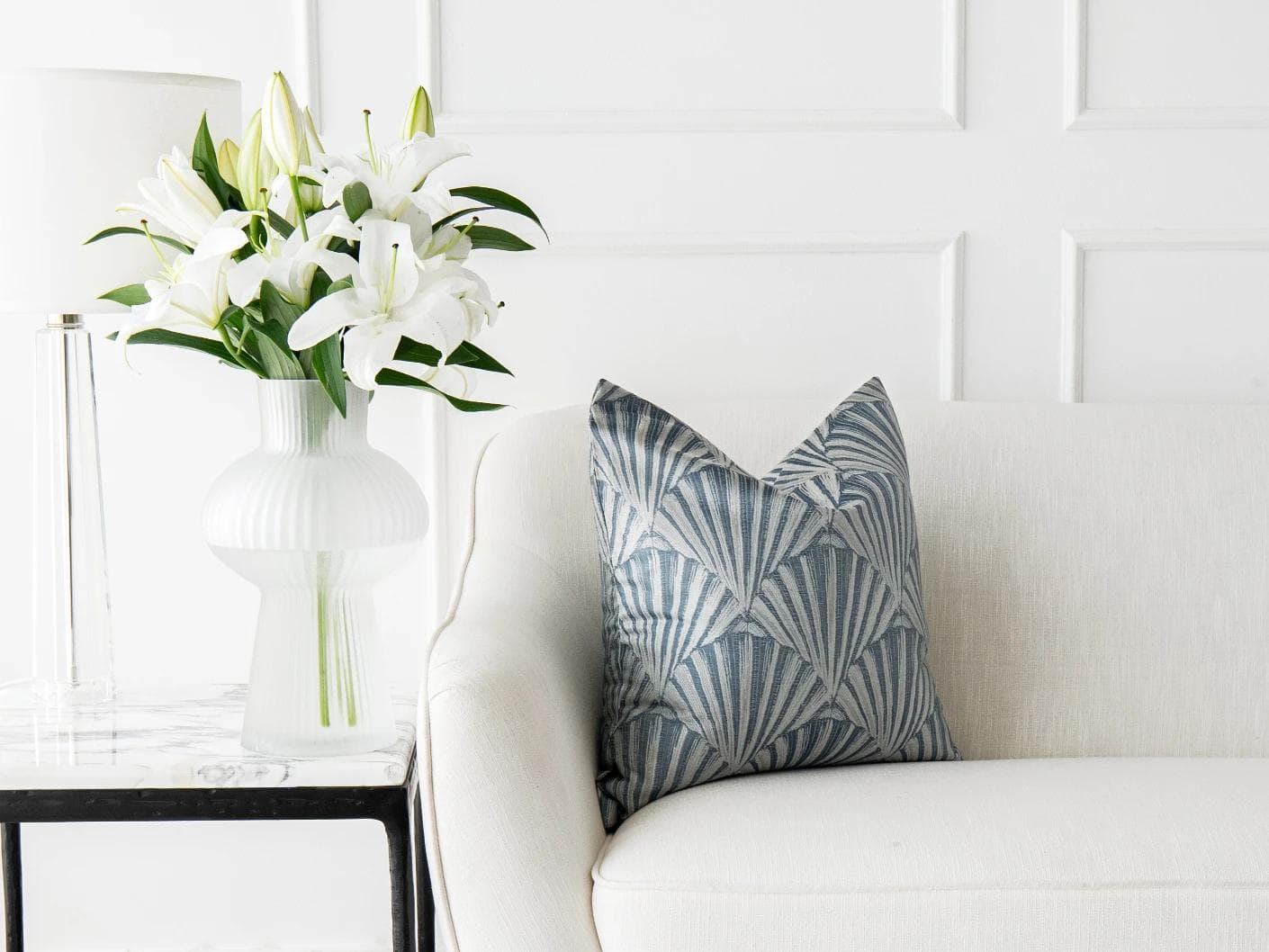 Ashlyn Canova cushion in blue and silver, shown in a lifestyle front view as image 4