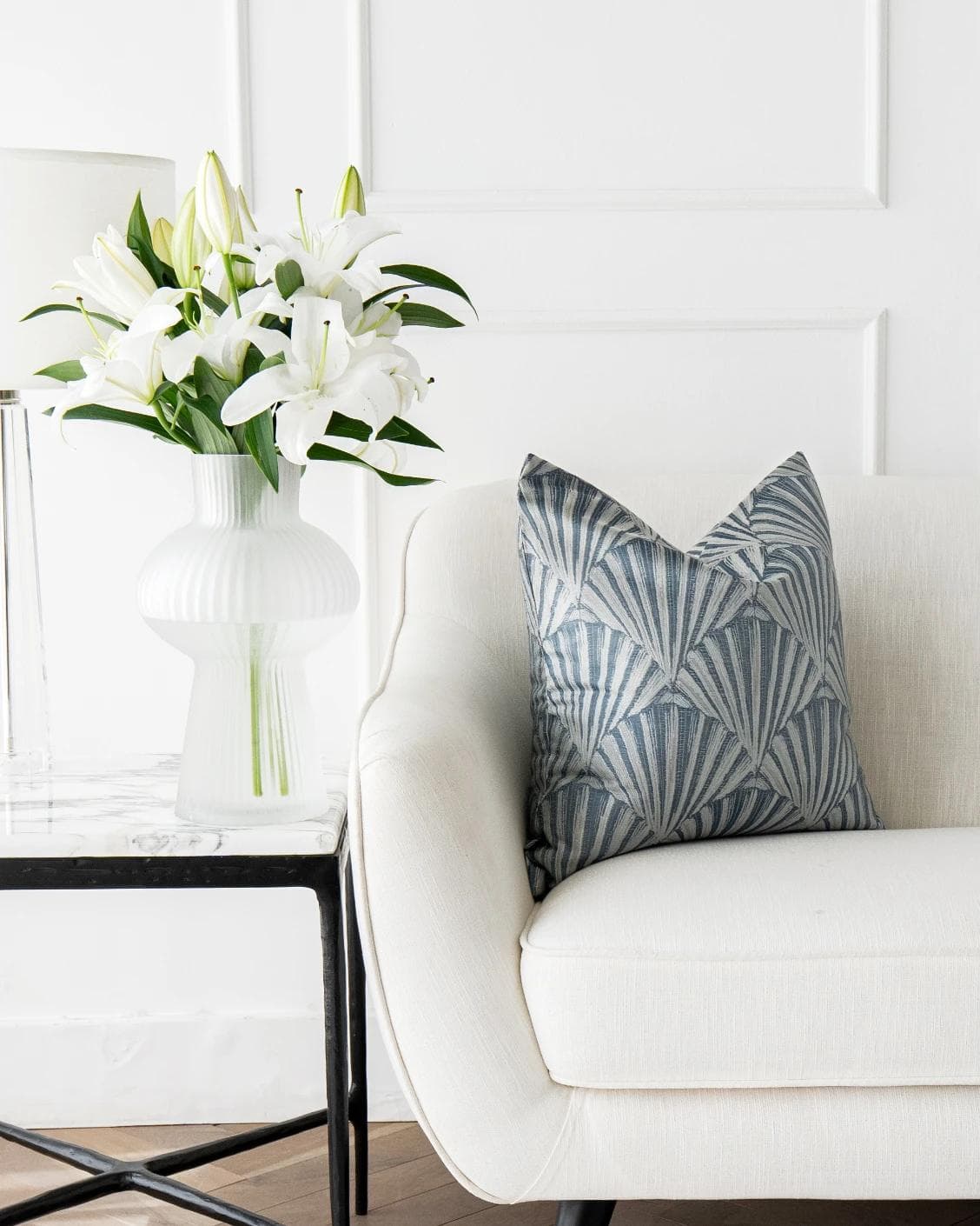 Ashlyn Canova cushion in blue and silver, shown in a lifestyle front view as image 4