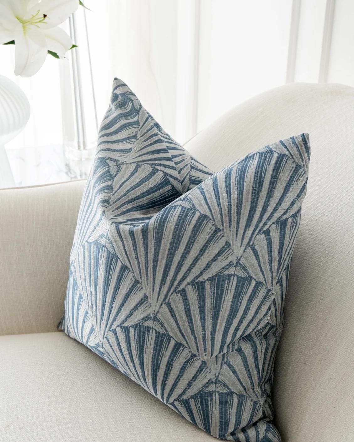 Ashlyn Canova cushion in blue and silver, shown in a lifestyle right view as image 5