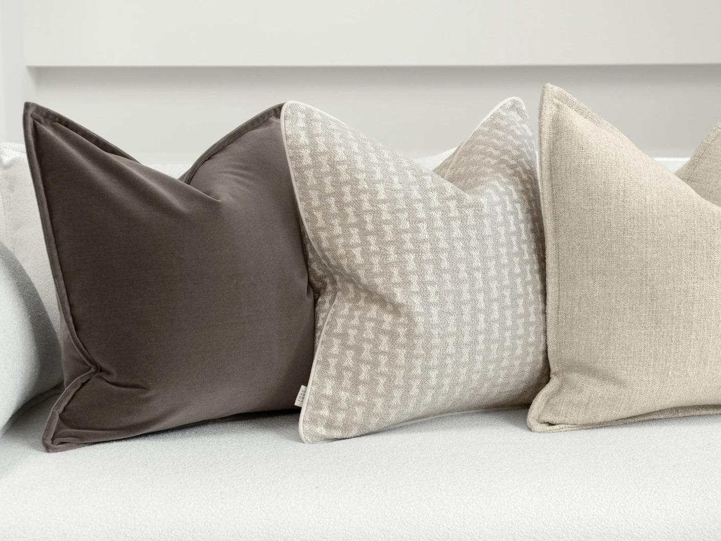 Astle Bundle cushion in ivory, beige and brown, shown in a product left view as image 6