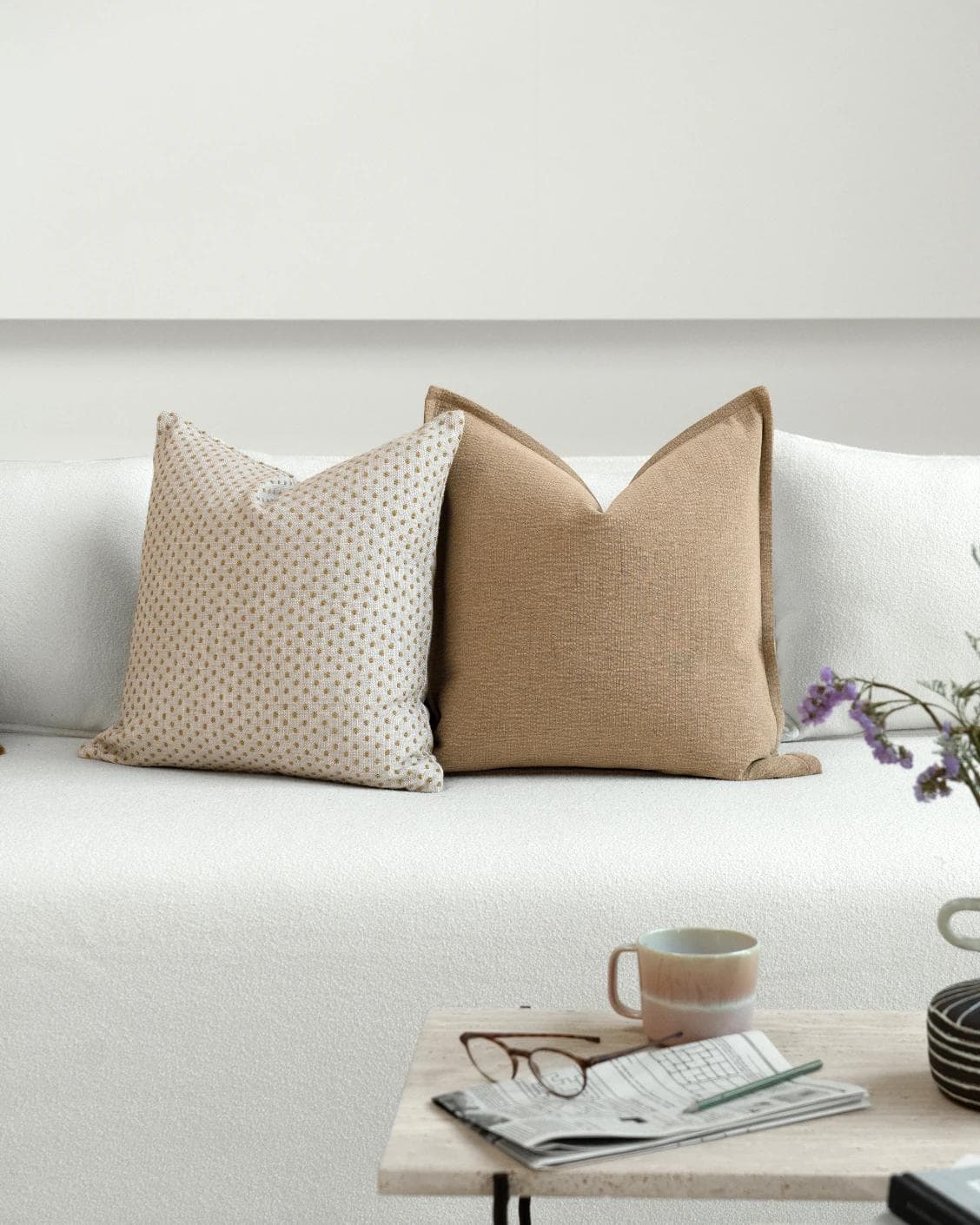 Astra Bundle cushion in beige, brown and orange, shown in a lifestyle front view as image 5