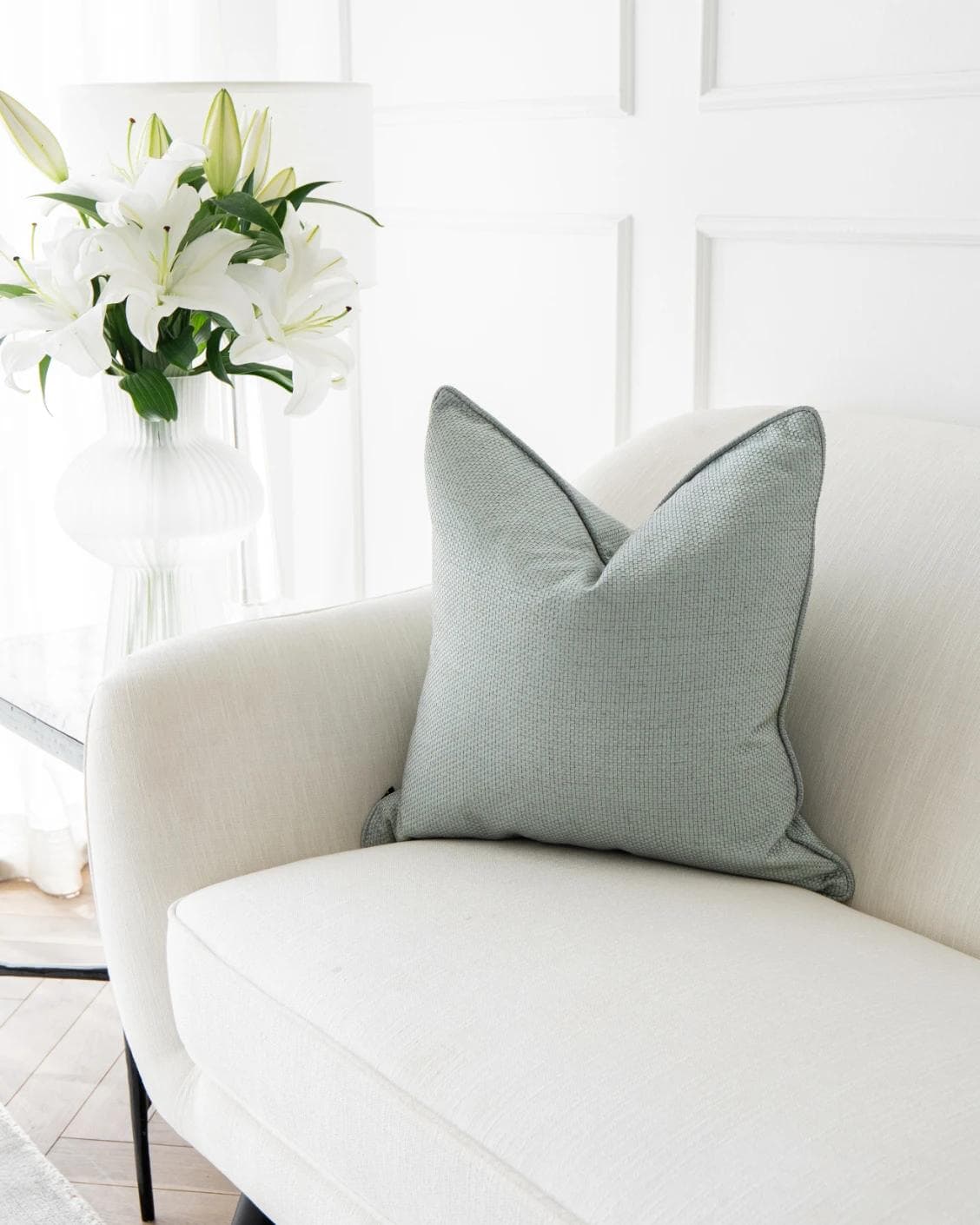 Astrid Sage cushion in green, shown in a lifestyle right view as image 2