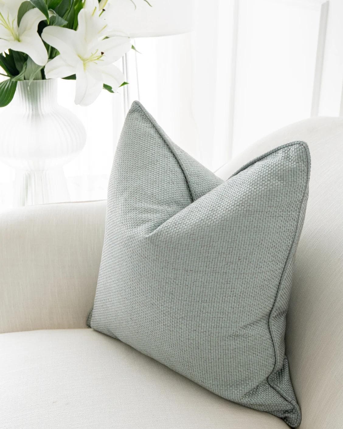 Astrid Sage cushion in green, shown in a product right view as image 6