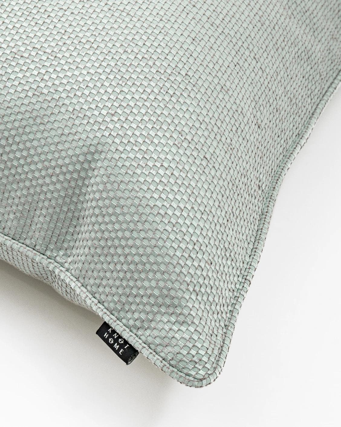 Astrid Sage cushion in green, shown in a product top view as image 7