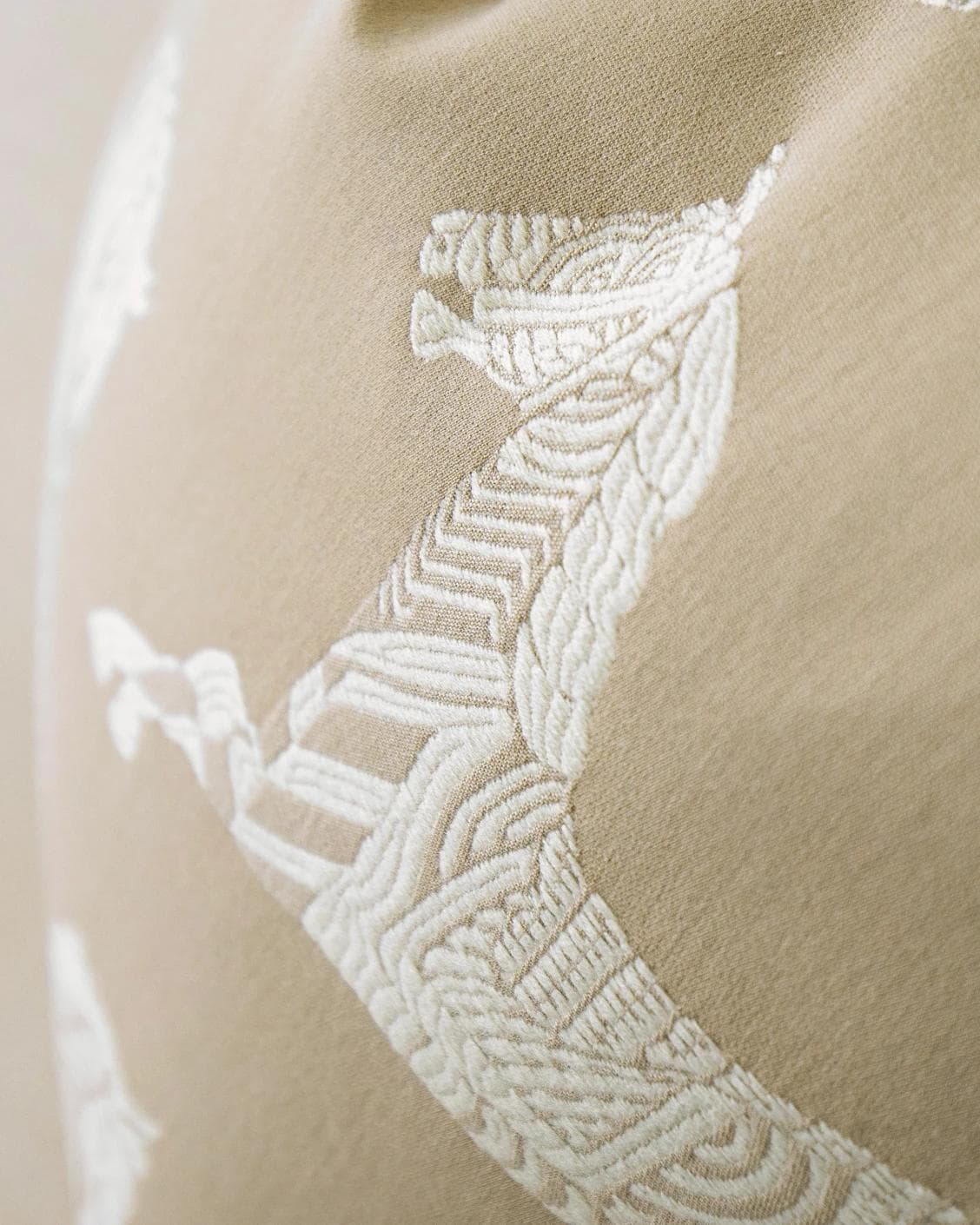 Aurora Hodler cushion in beige, shown in a product close-up as image 7