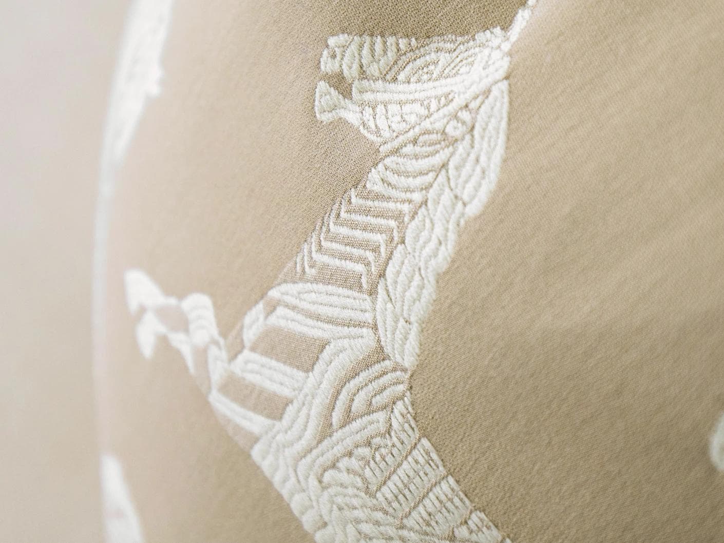 Aurora Hodler cushion in beige, shown in a product close-up as image 7