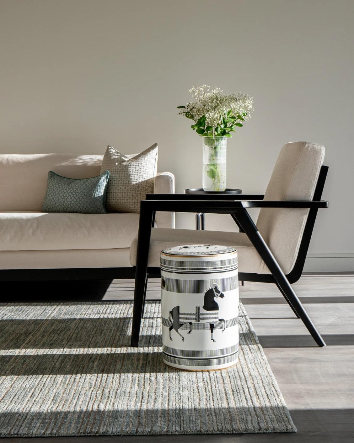 Aurora Jacobsen stools in white and black, shown in a lifestyle front view as image 6