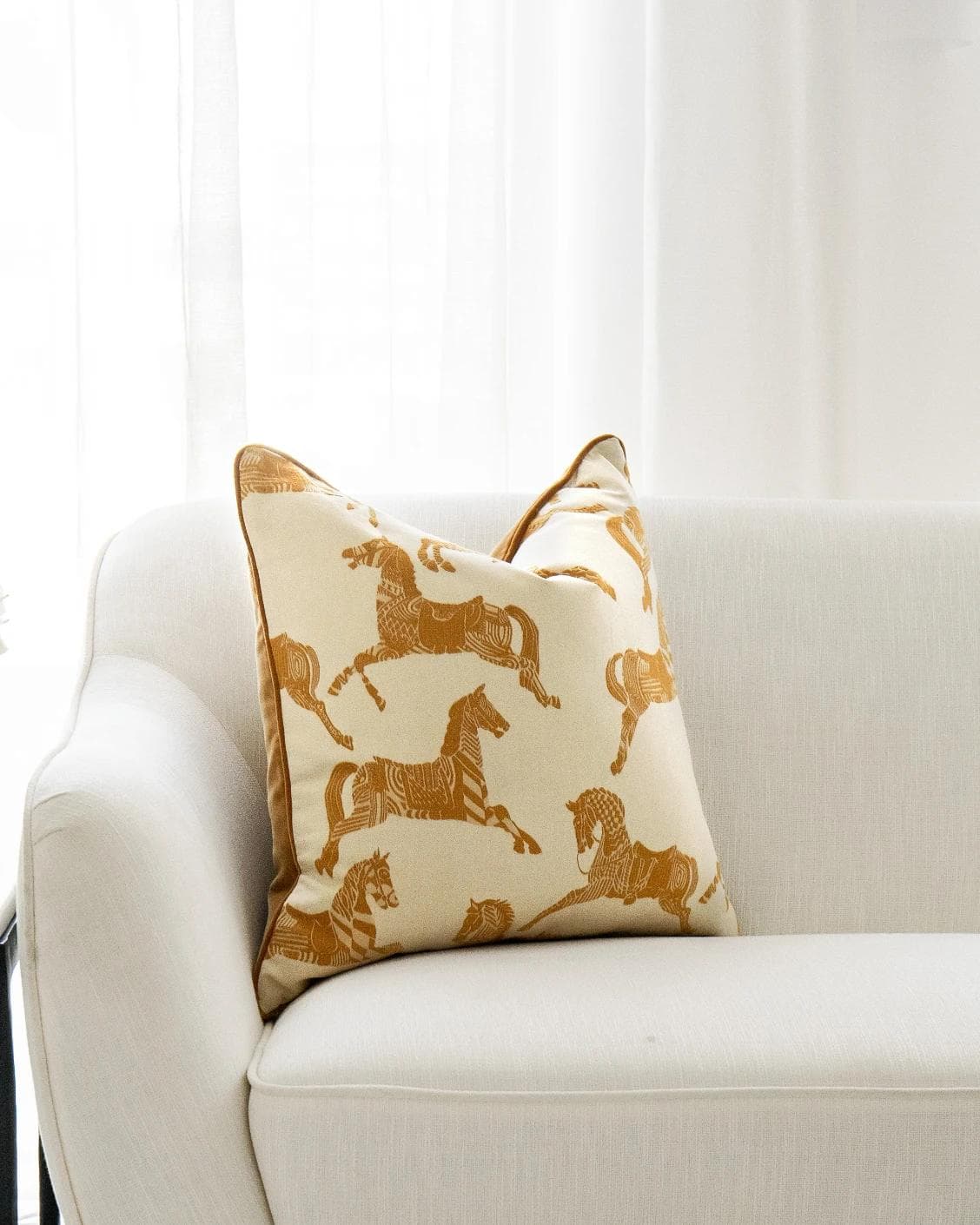 Aurora Klimt cushion in orange and beige, shown in a lifestyle front view as image 4