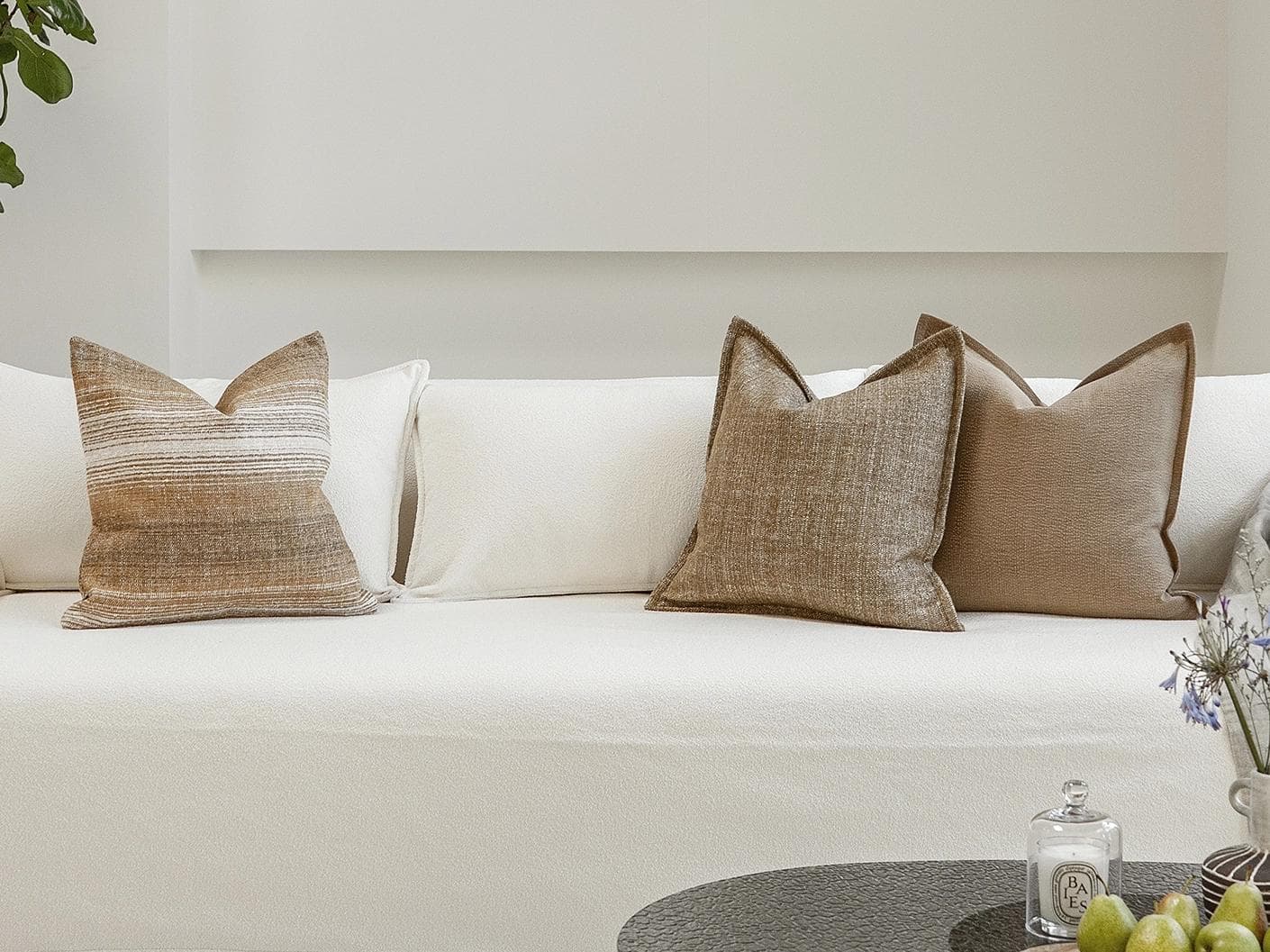Aya Bundle cushion in brown, shown in a lifestyle front view as image 4