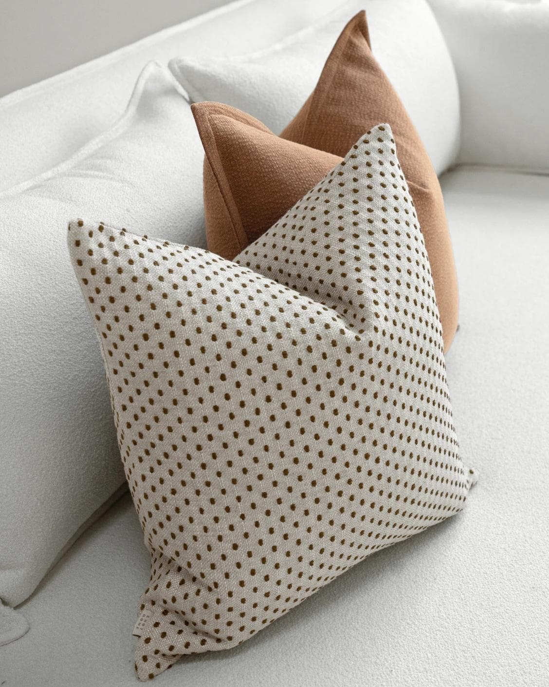 Azar Bundle cushion in beige and rust, shown in a product left view as image 6
