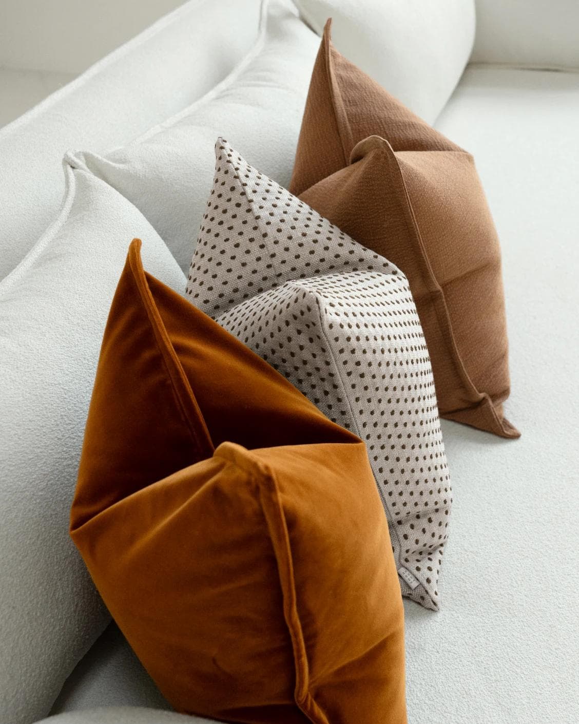 Azar Bundle cushion in beige and rust, shown in a product left view as image 7