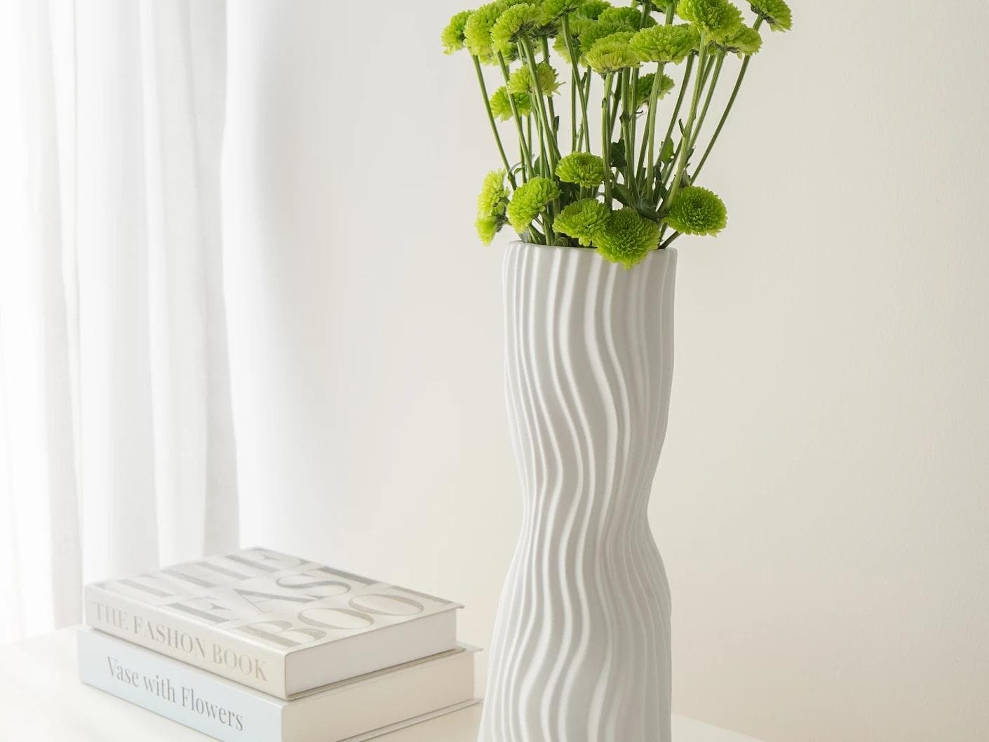 Baiza Arneson vases in white, shown in a lifestyle right view as image 6