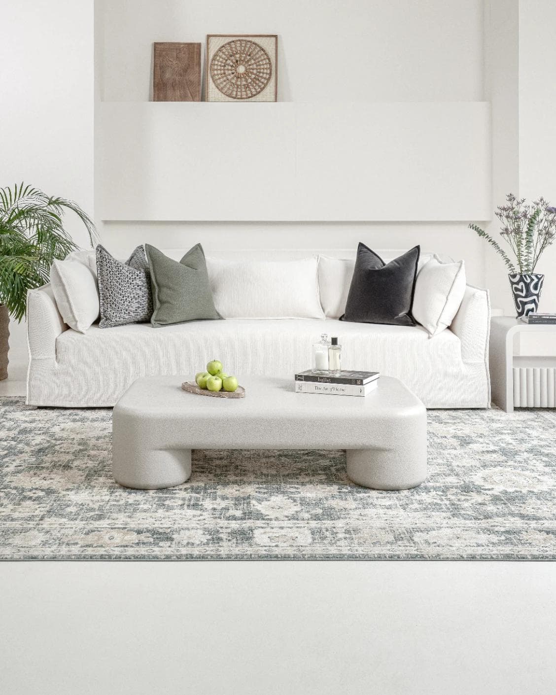Bari coffee table in soft ivory and stone, shown in a lifestyle front view as image 5