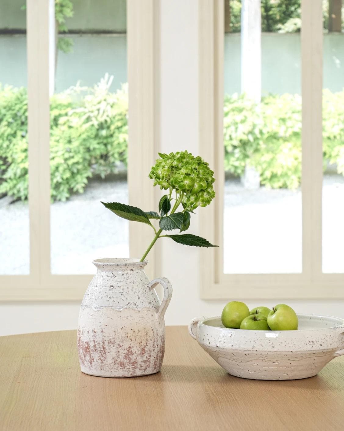 Becca Terra vases in soft stone and white, shown in a lifestyle front view as image 5