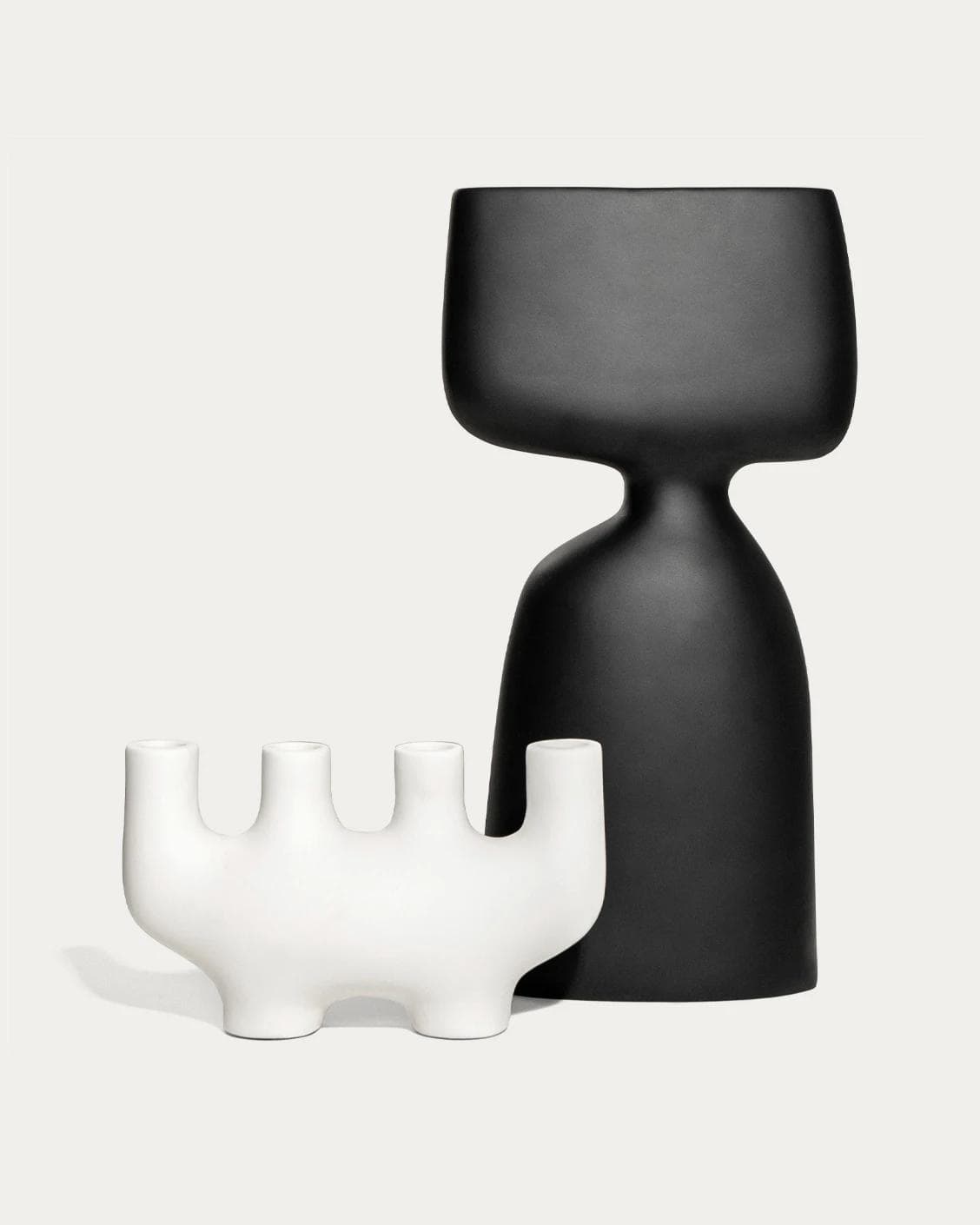 Berta Arneson vases in white and black, shown in a product front view as image 1