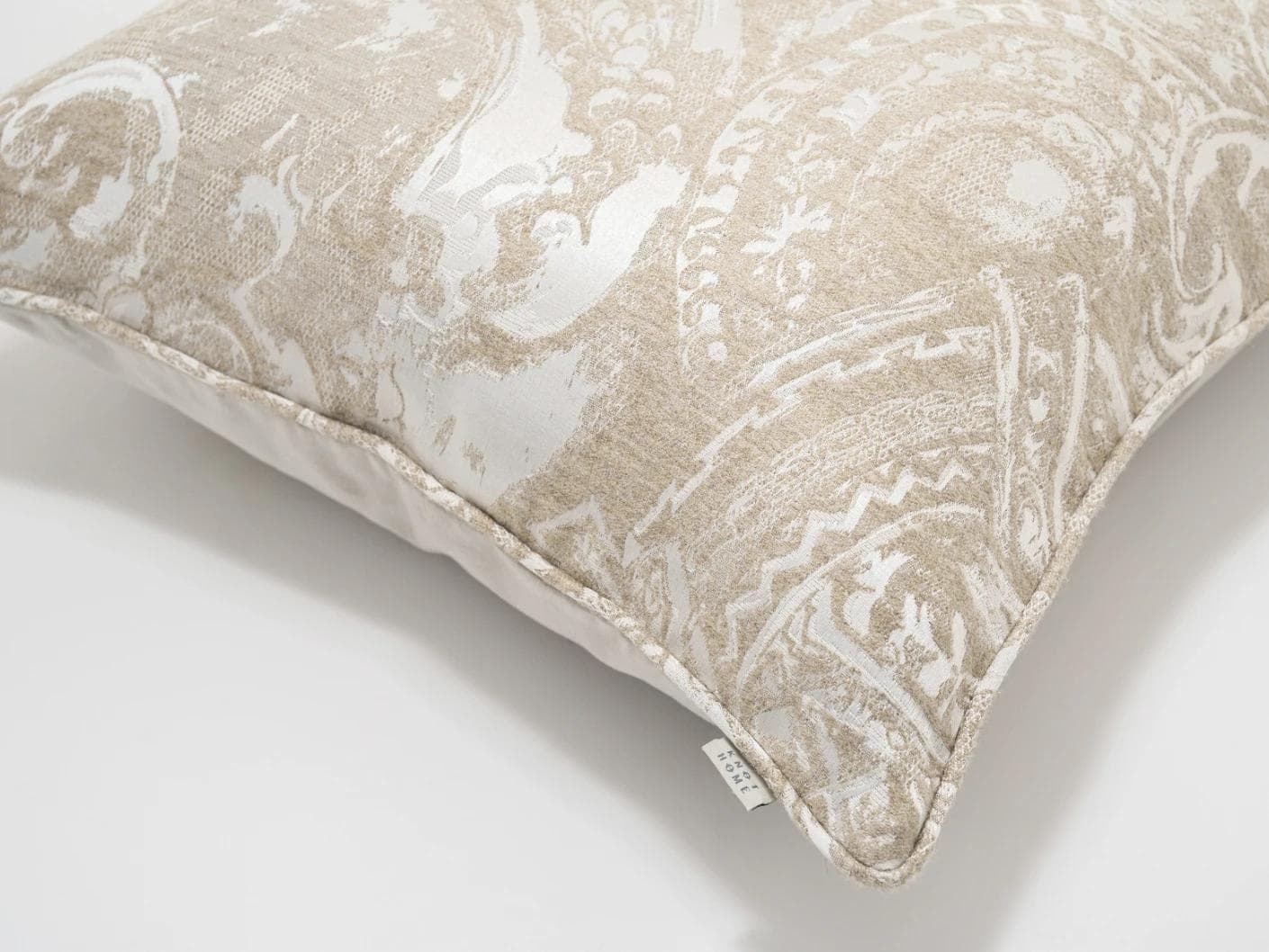 Berti Hodler cushion in beige and silver, shown in a product top view as image 8