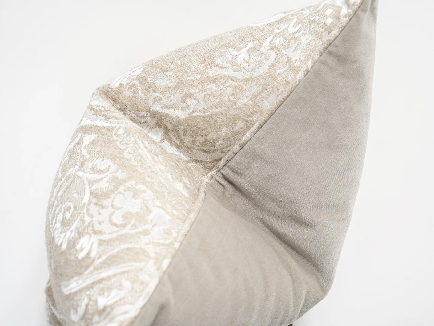 Berti Hodler cushion in beige and silver, shown in a product top view as image 9