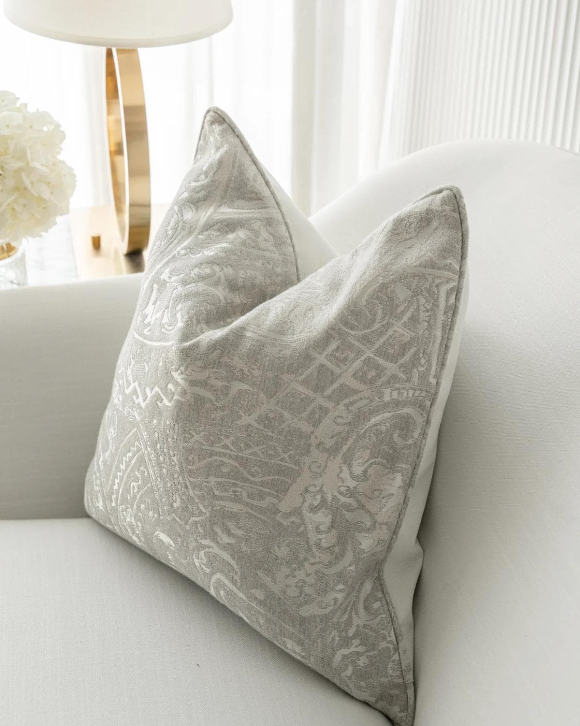 Berti Laurent cushion in silver, shown in a lifestyle right view as image 5