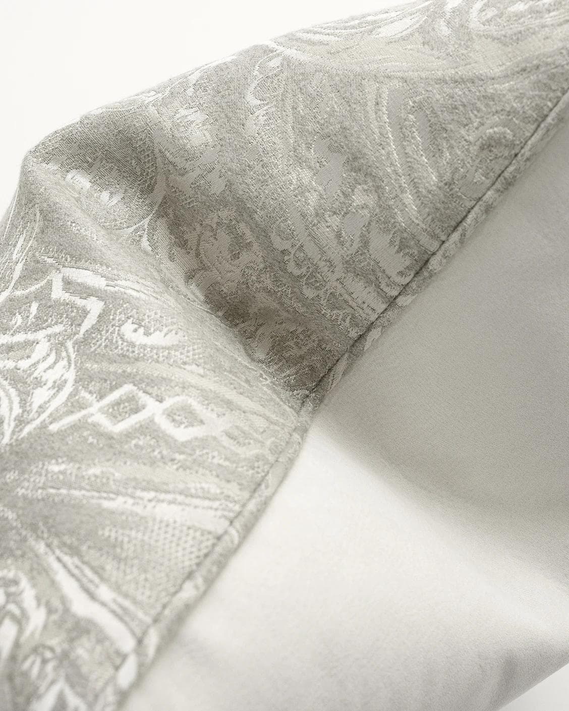 Berti Laurent cushion in silver, shown in a product front view as image 7