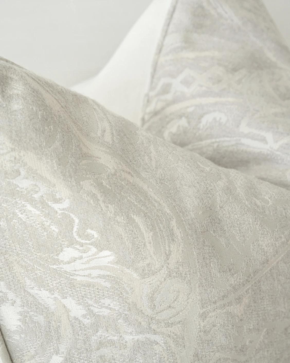 Berti Laurent cushion in silver, shown in a product left view as image 8