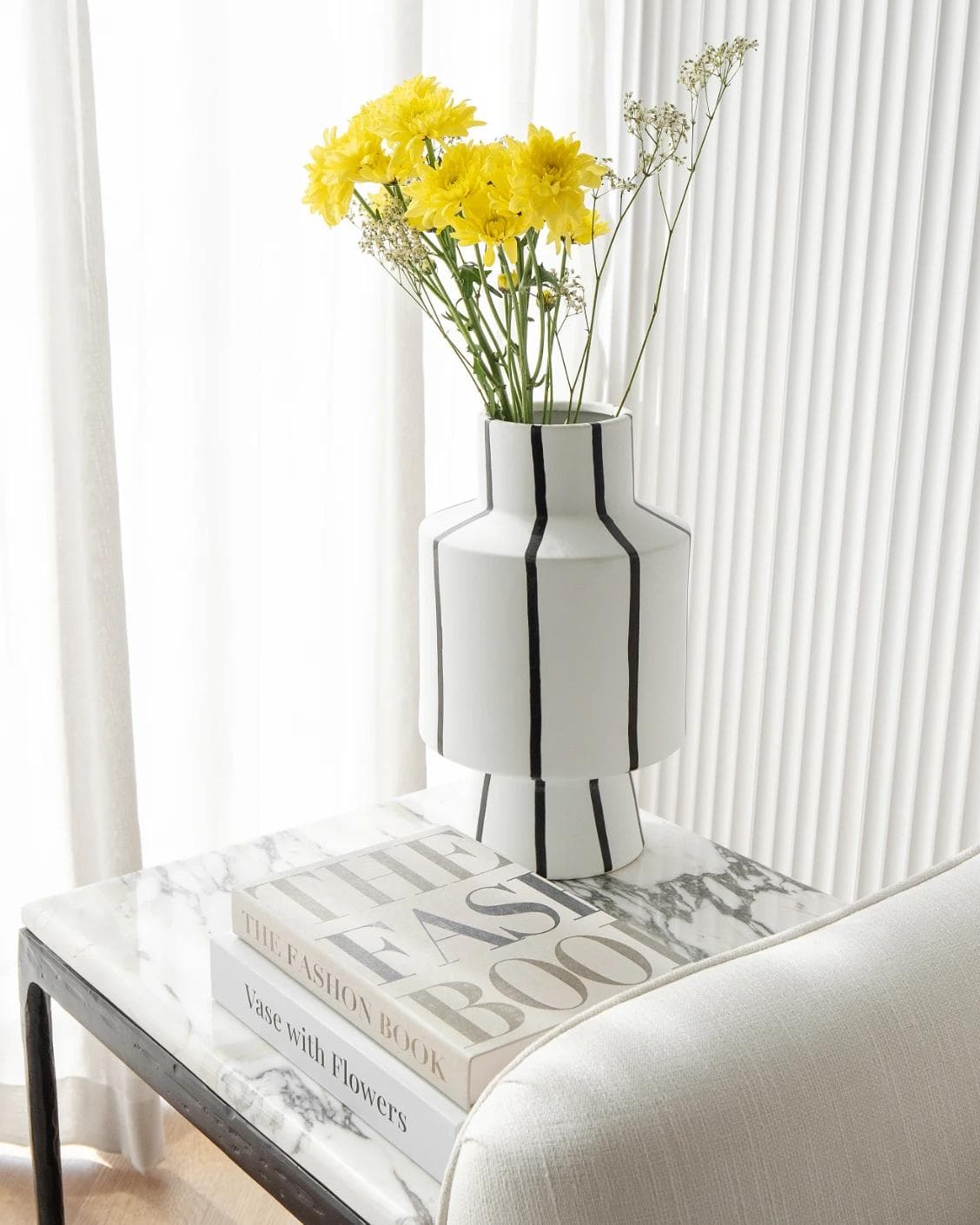 Bethany Arneson vases in white and black, shown in a lifestyle right view as image 5