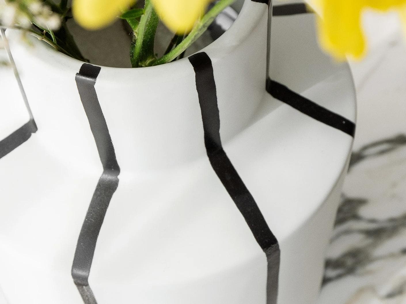 Bethany Arneson vases in white and black, shown in a lifestyle top view as image 6