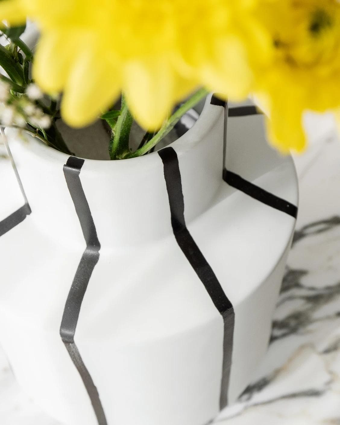 Bethany Arneson vases in white and black, shown in a lifestyle top view as image 6