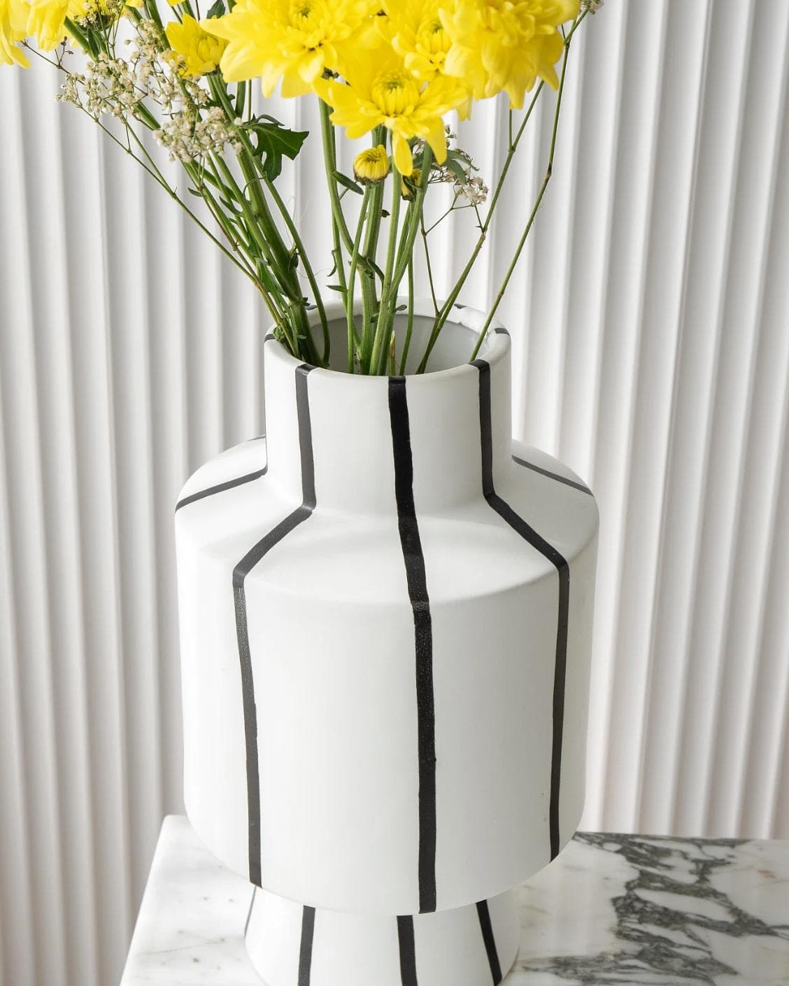Bethany Arneson vases in white and black, shown in a lifestyle top view as image 7