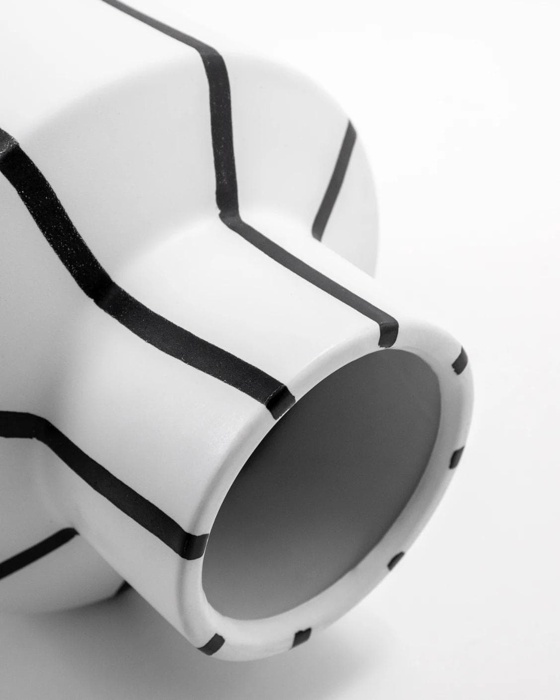 Bethany Arneson vases in white and black, shown in a product close-up as image 10