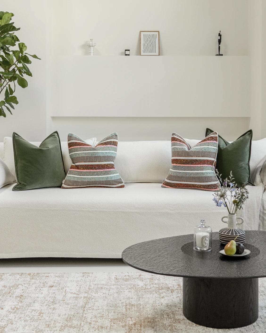Blaire Bundle cushion in multicolour and green, shown in a lifestyle front view as image 4