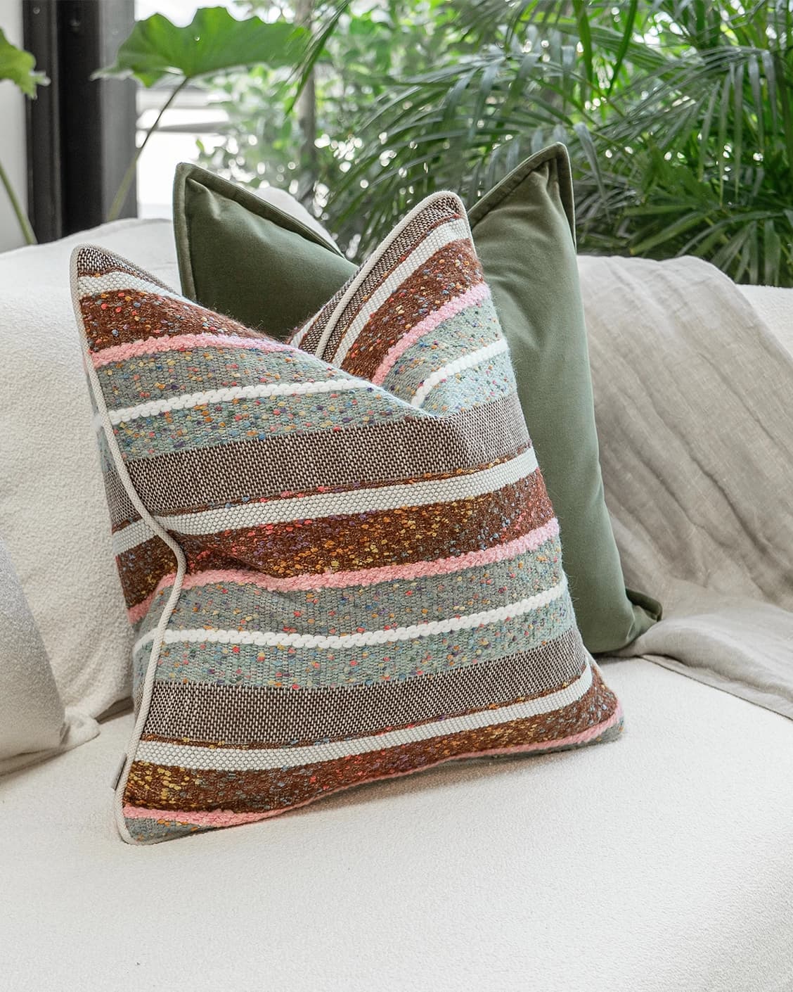 Blaire Bundle cushion in multicolour and green, shown in a lifestyle left view as image 6