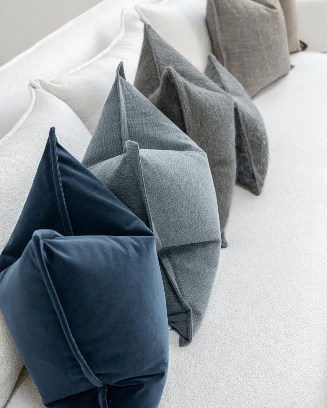 Bracia Bundle cushion in brown, grey and blue, shown in a product left view as image 7