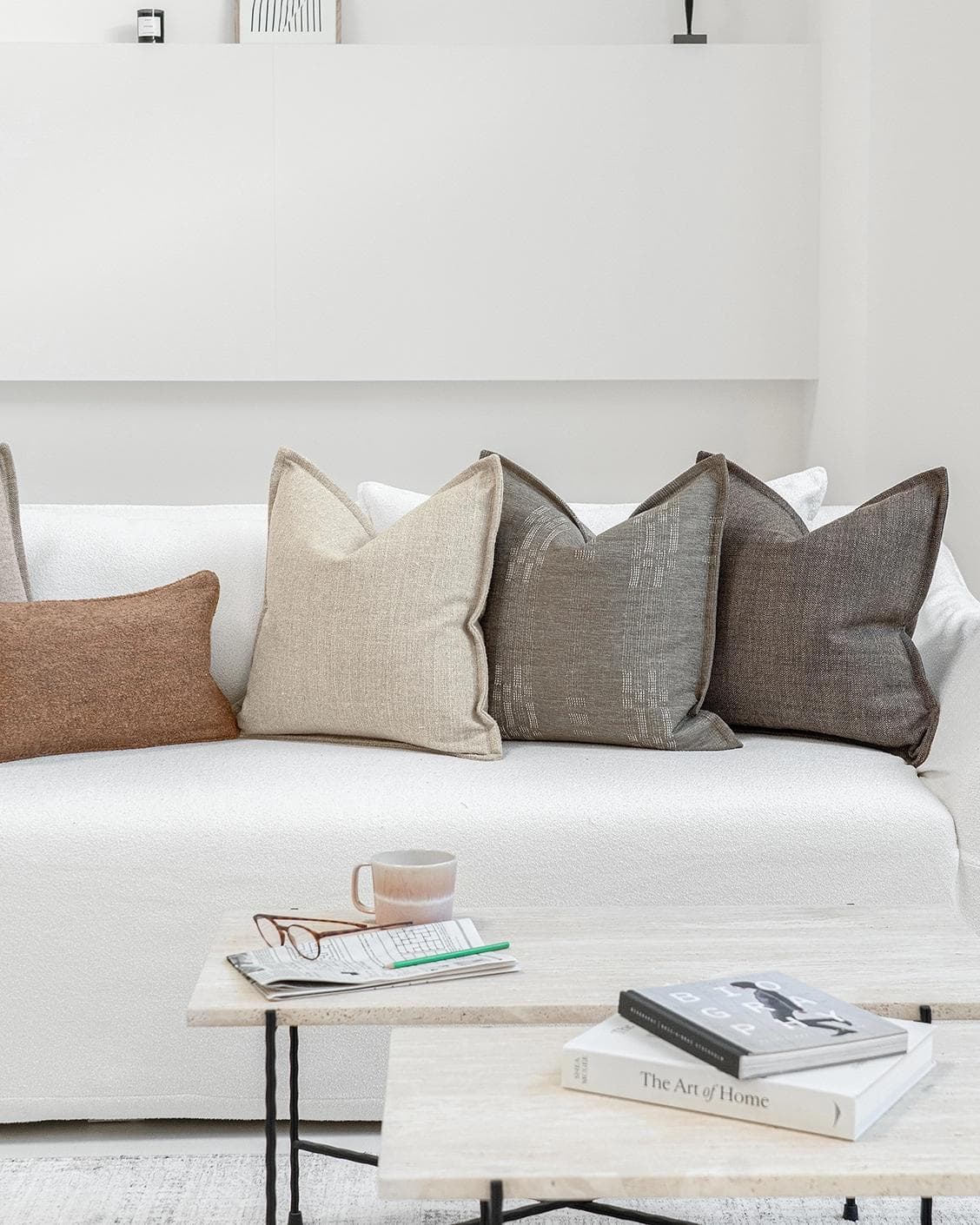 Bretty Bundle cushion in brown, charcoal, taupe and beige, shown in a lifestyle front view as image 5
