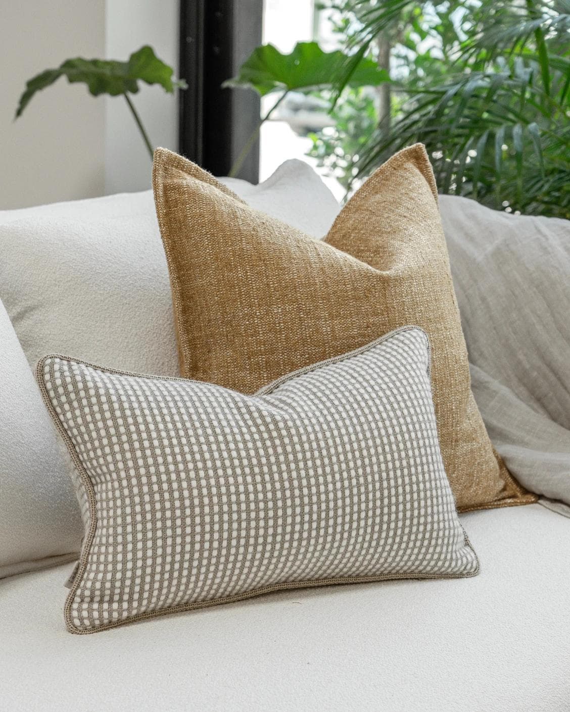 Bryan Bundle cushion in yellow and white, shown in a lifestyle left view as image 5