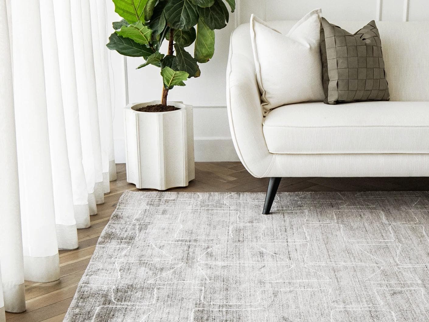 Caleb Dune carpet in grey and blue, shown in a lifestyle front view as image 4