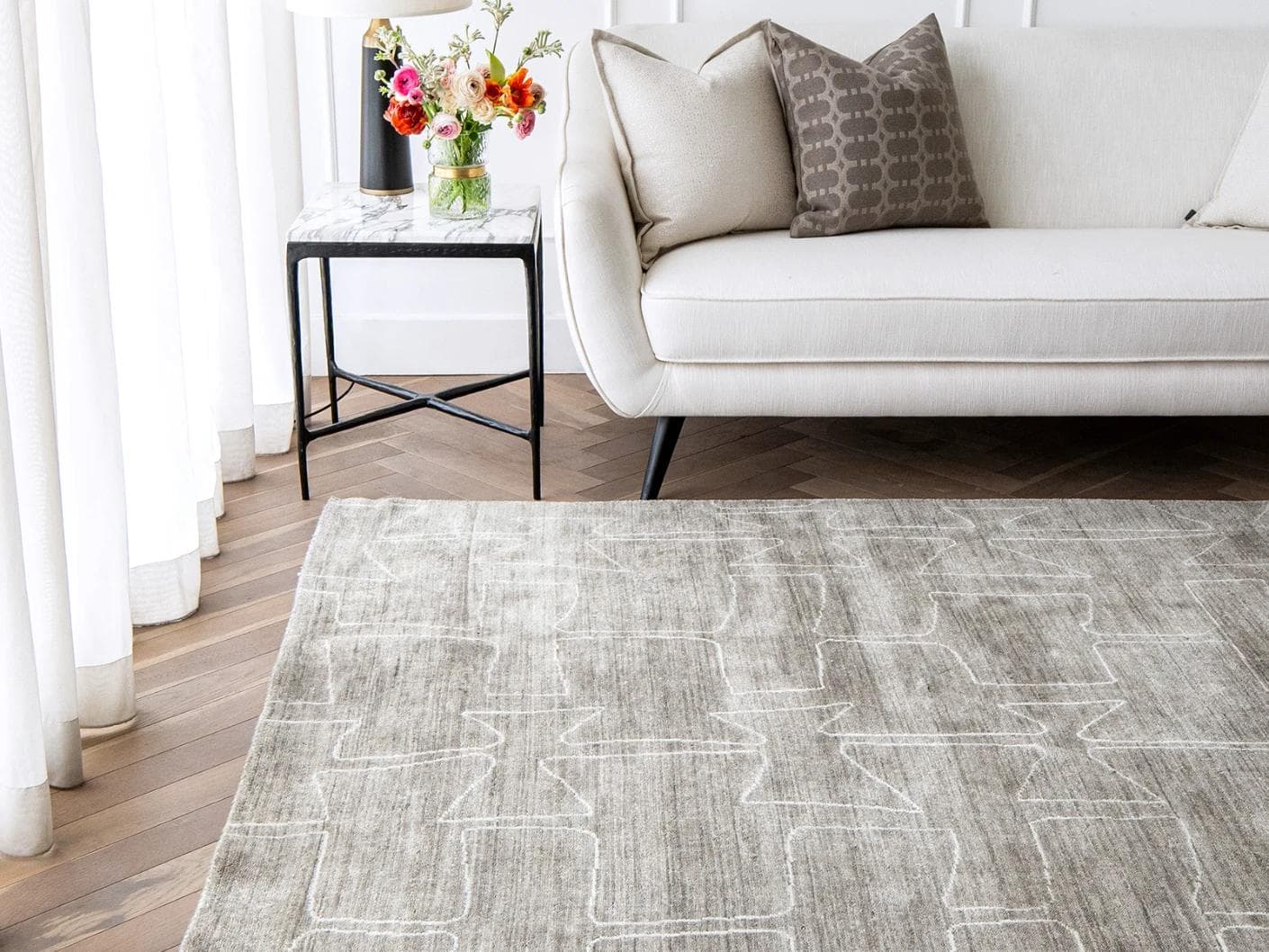 Caleb Dune carpet in grey and blue, shown in a lifestyle front view as image 5