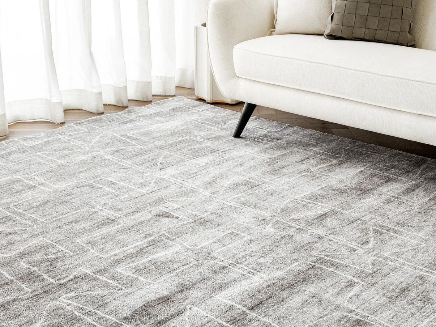 Caleb Dune carpet in grey and blue, shown in a lifestyle right view as image 6