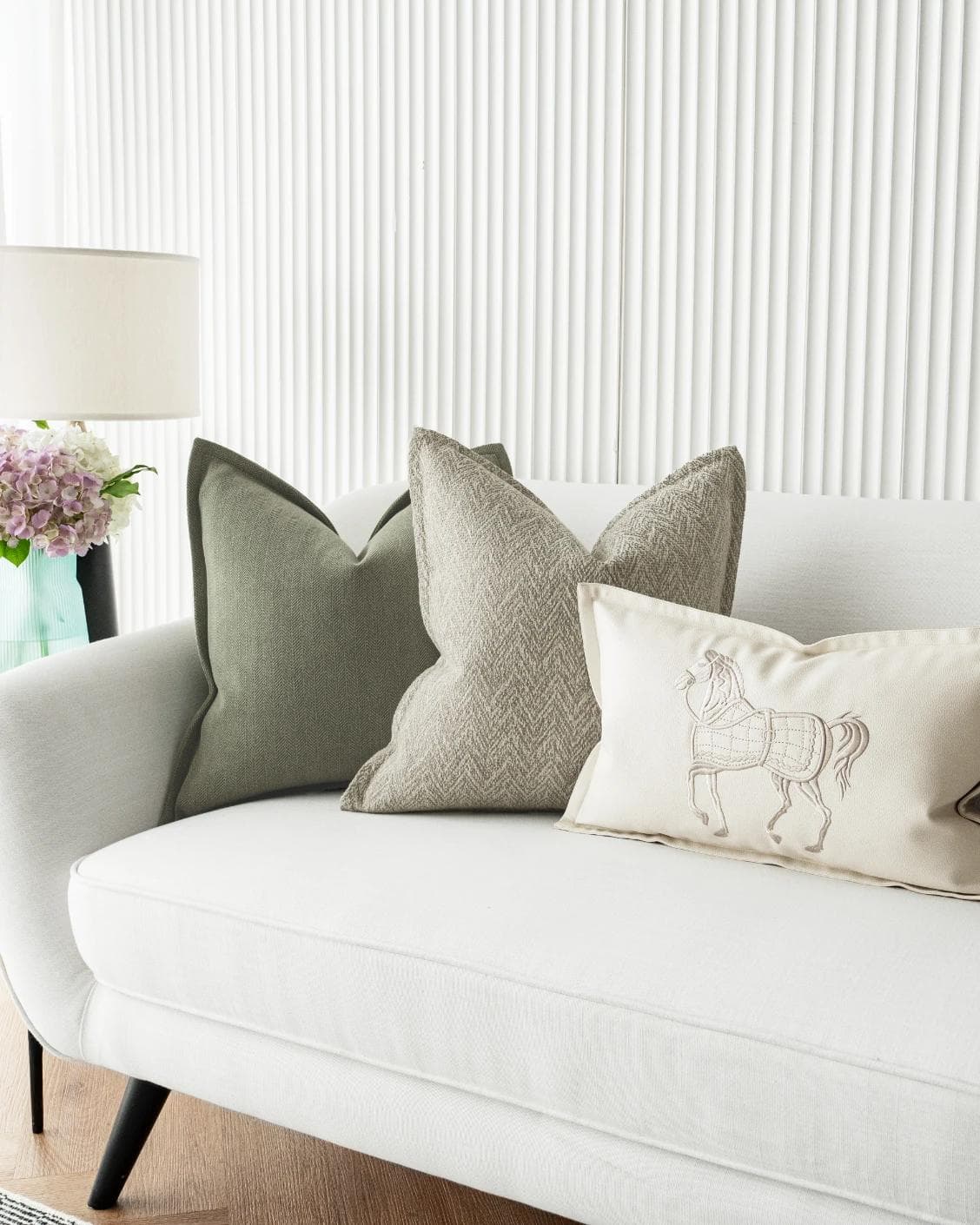 Cali Bundle cushion in white, beige and green, shown in a lifestyle right view as image 5