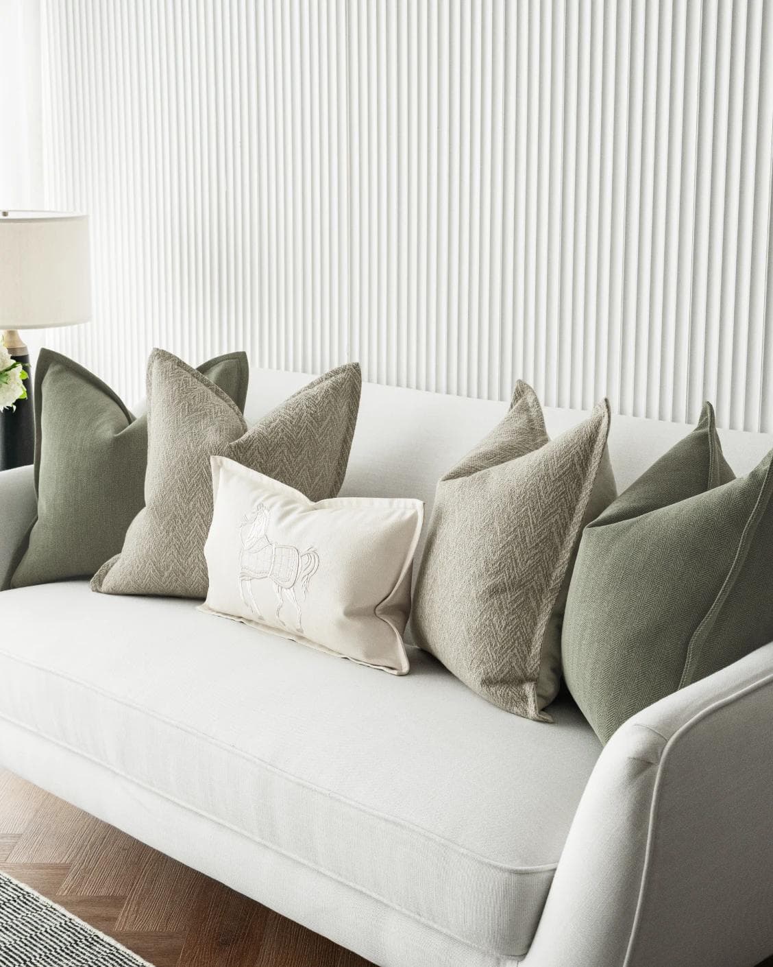 Cali Bundle cushion in white, beige and green, shown in a lifestyle right view as image 6