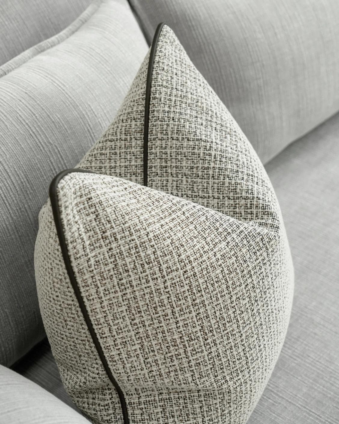 Cami Steele cushion in charcoal, shown in a lifestyle top view as image 5