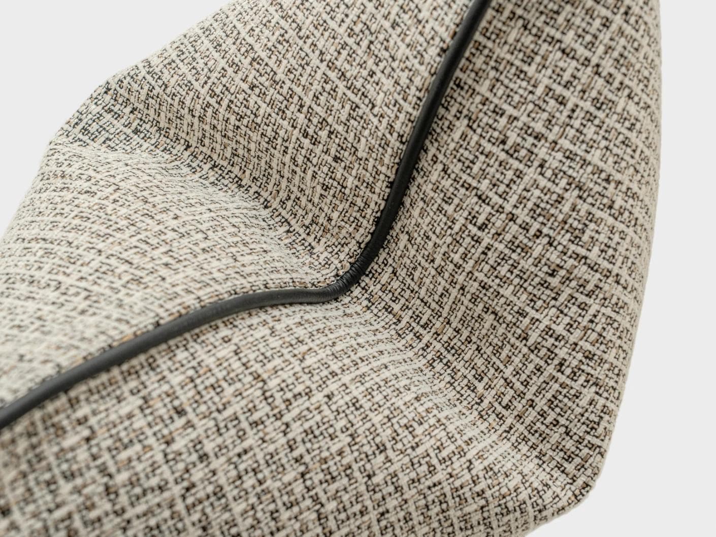 Cami Steele cushion in charcoal, shown in a product close-up as image 7
