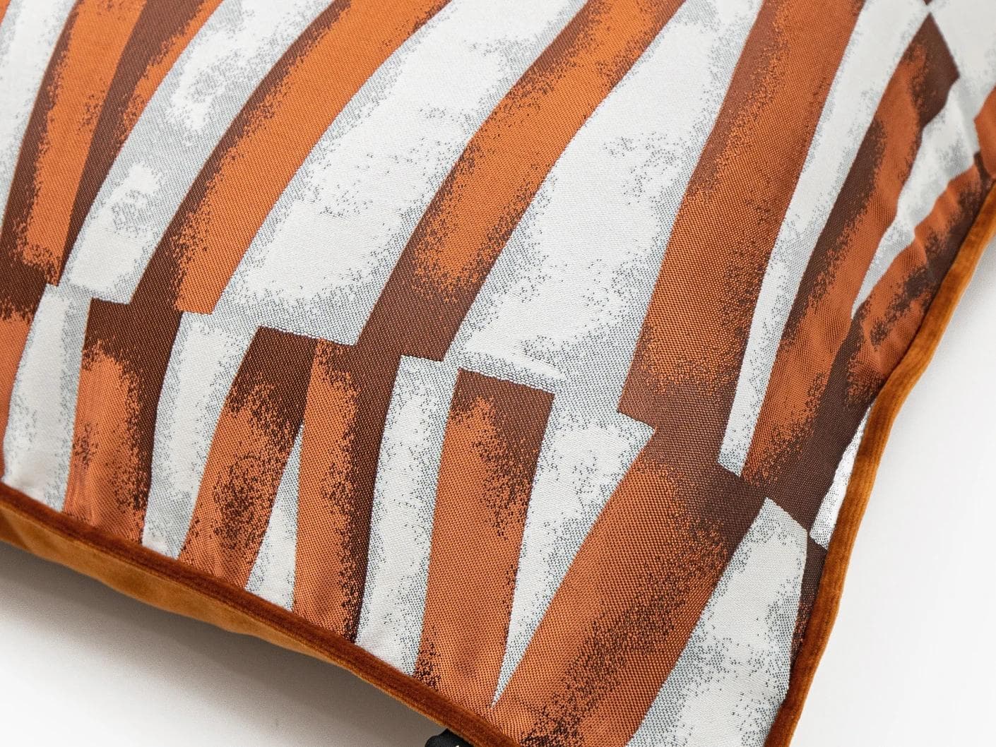 Carlie Hodler cushion in orange and white, shown in a product close-up as image 6
